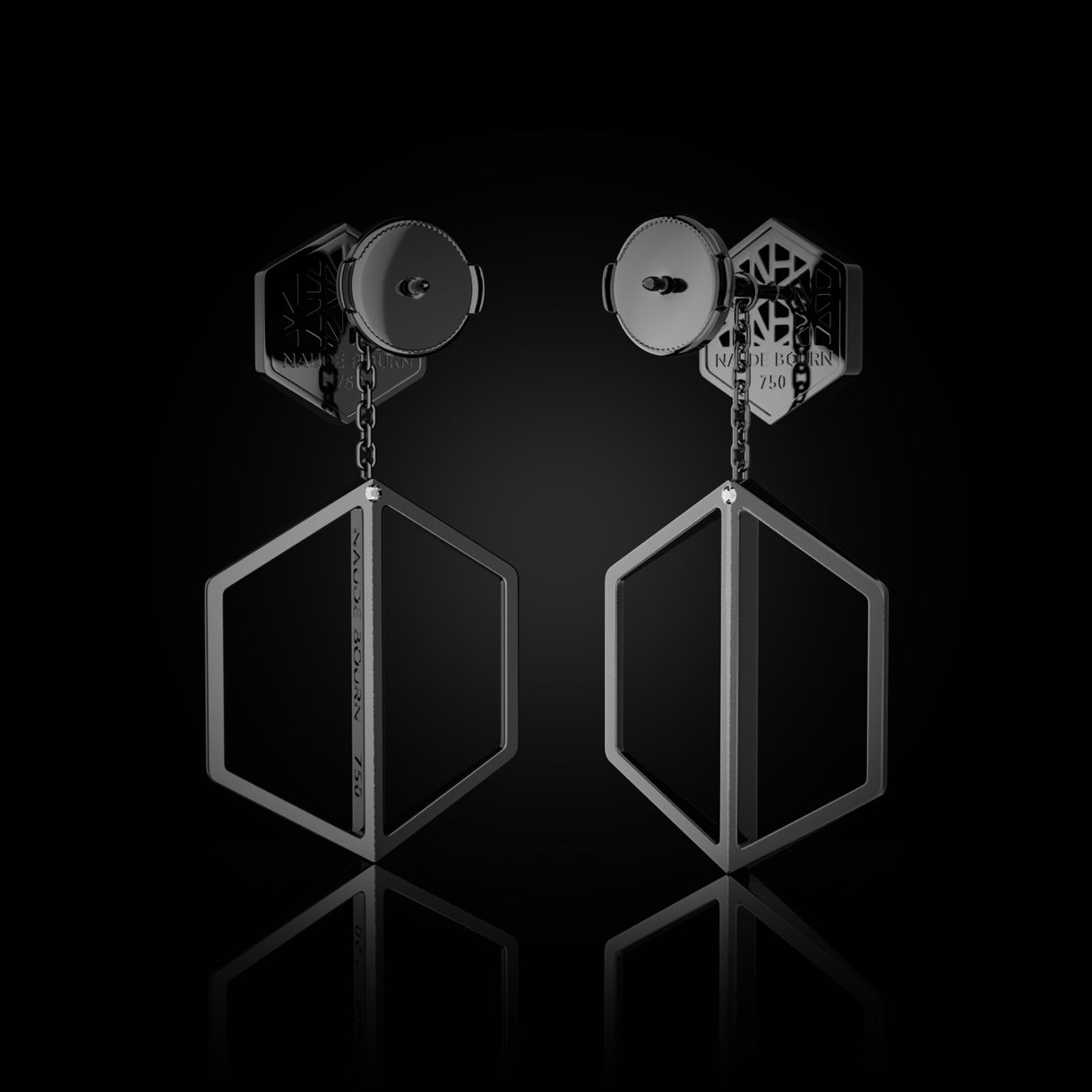 Back view of Know You Studs with Short Illuminate You Dangles in Stealth Black Gold. Edgy 18k gold pairing, crafted for runway moments, celebrity styling, and bold minimalist impact. Sustainable gold jewelry, ethical jewelry, handcrafted artisan jewelry, fine jewelry, high-end jewelry, and ethical luxury. A striking combination from sustainable jewelry brands and a unique jewelry gift in black gold.